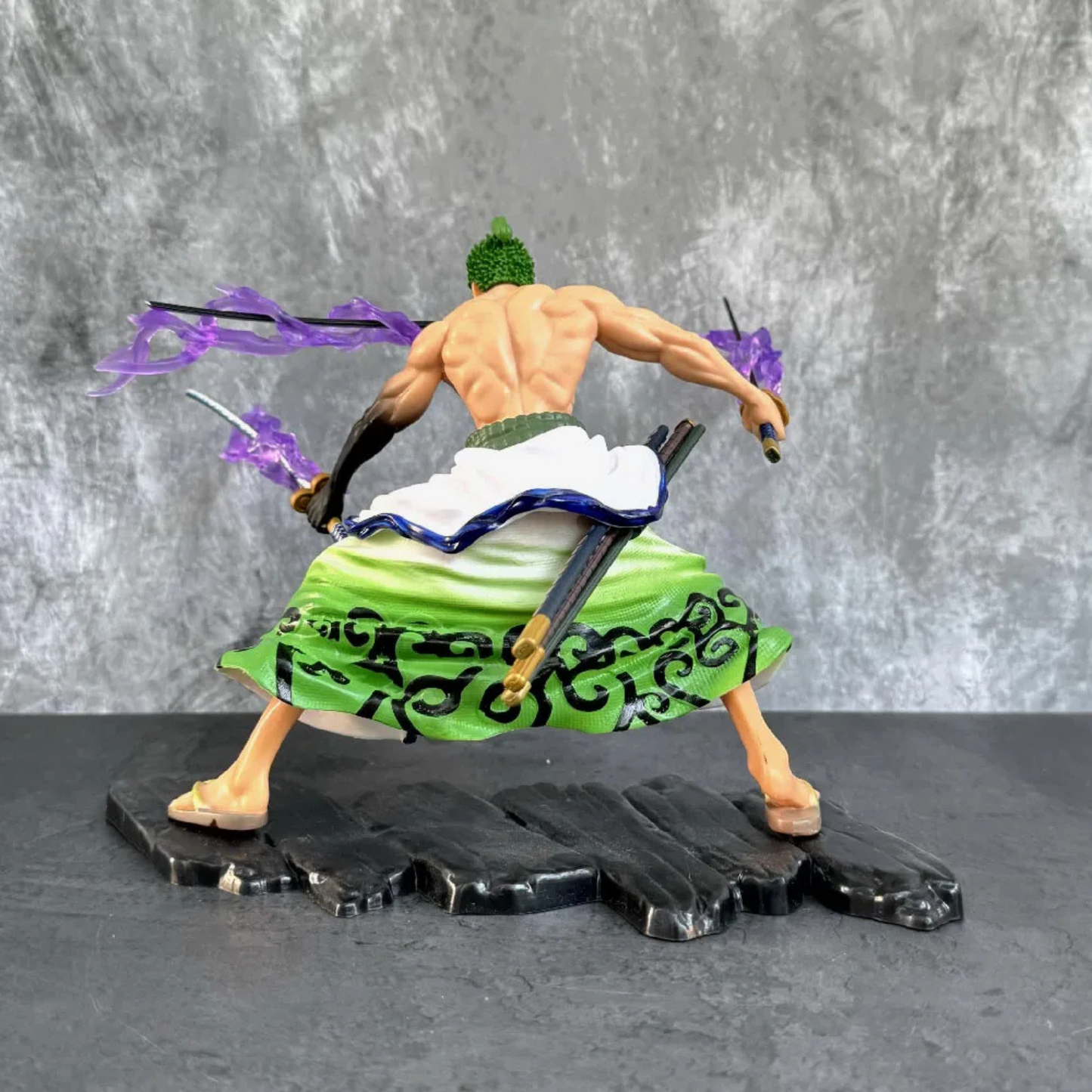 Roronoa Zoro Battle Mode Action Figure – One Piece collectible with three swords and purple energy effects (18 cm)