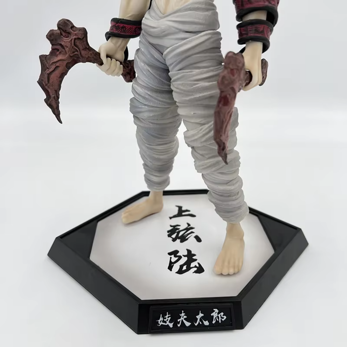 Demon Slayer Gyutaro action figure holding twin sickles
