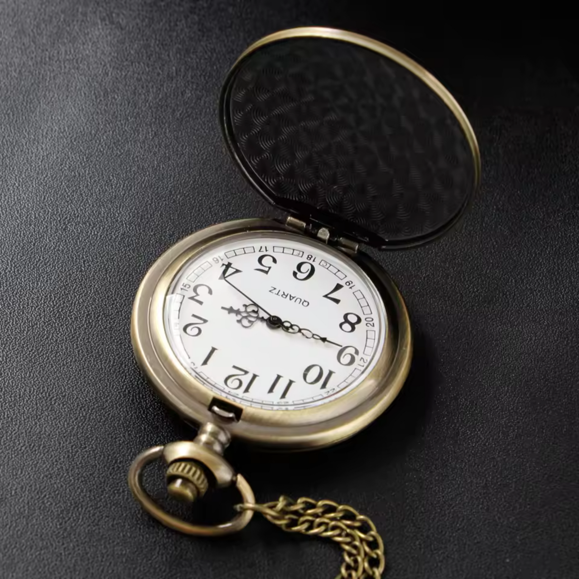 Vintage-style Batman metal pocket watch with keychain attachment featuring the iconic bat symbol
