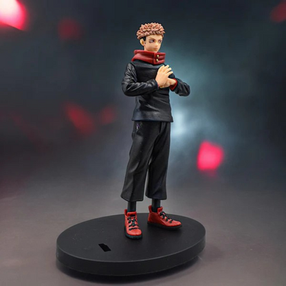 Jujutsu Kaisen Itadori Yuji action figure in school uniform with red hoodie, standing on a display base against a red-dark background