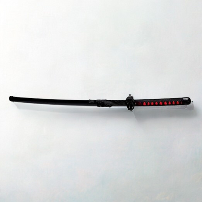 Black and red Ichigo Kurosaki wooden katana from Bleach anime, with jagged blade and decorative guard