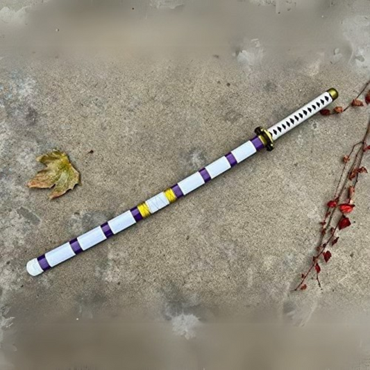 Wooden replica of Monkey D. Luffy's Nidai Kitetsu katana from One Piece, featuring white, purple, and yellow wrap detailing