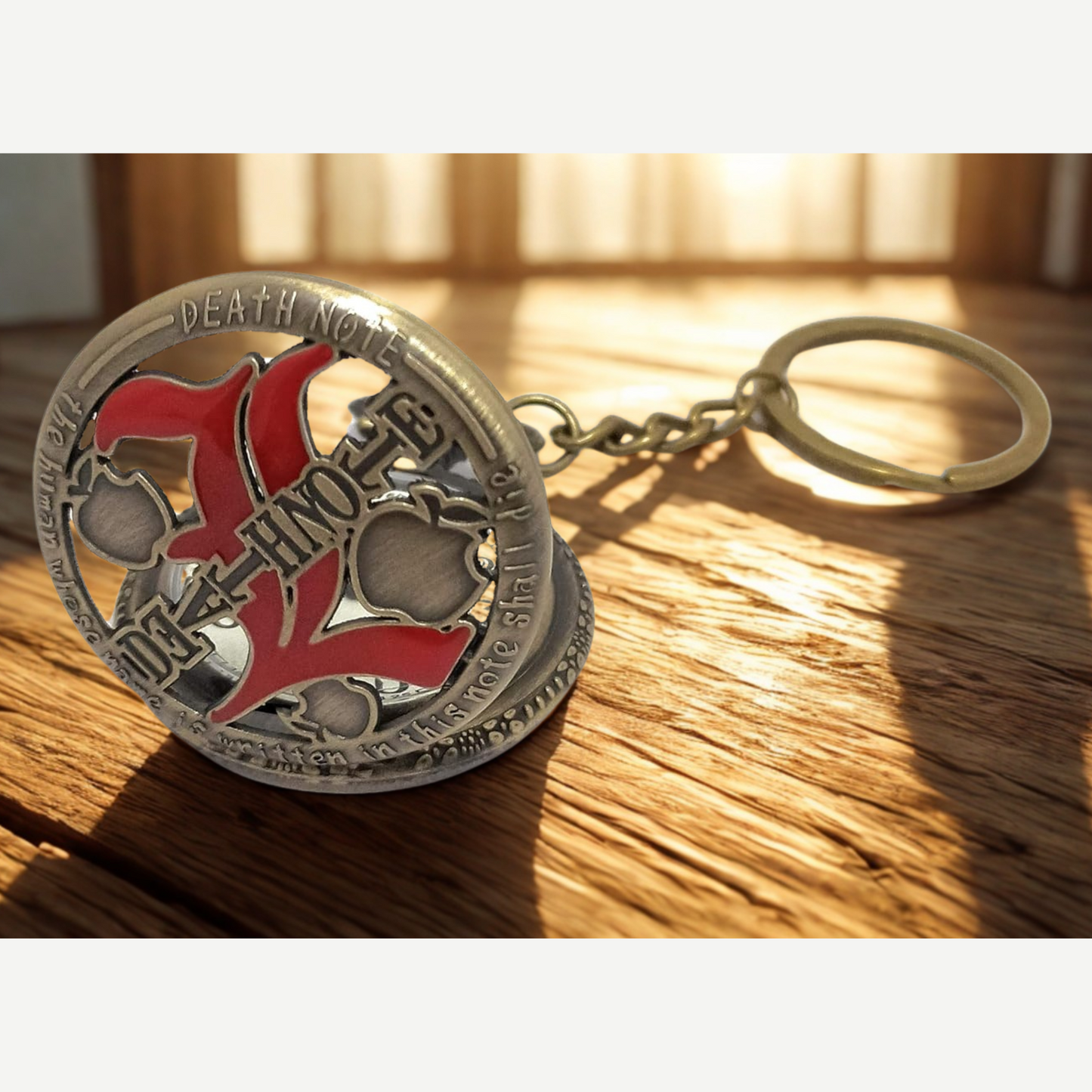 Close-up of engraved Death Note pocket watch with bold numerals and sleek finish