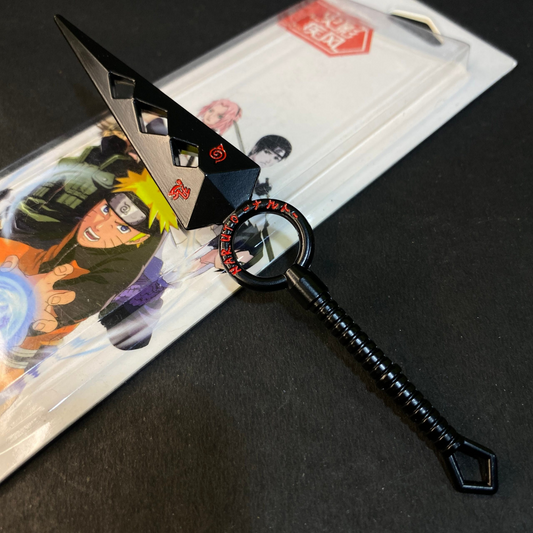 Naruto Uchiha clan kunai with diamond cutouts and red engraved symbols on black blade