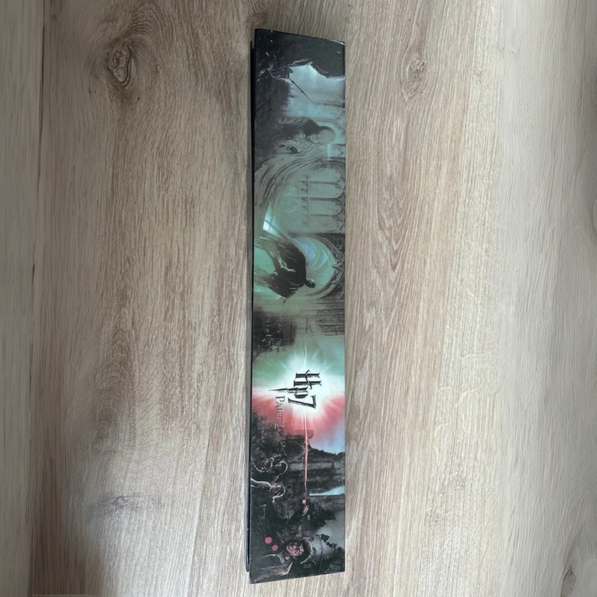 Hermione’s replica wand resting inside a velvet-lined collector's gift box