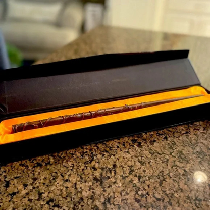 Hermione’s replica wand resting inside a velvet-lined collector's gift box