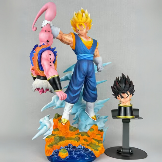 Dragon Ball Z action figure showing Super Saiyan Vegita lifting Majin Buu in battle pose with detailed rocky base and energy effects