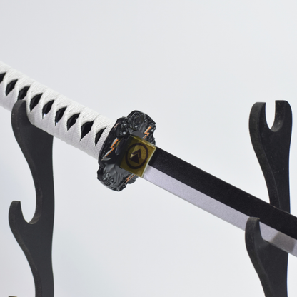 Ghost of Tsushima: Jin Sakai Wooden Katana 104cm - handle and tsuba resting on the black display stand