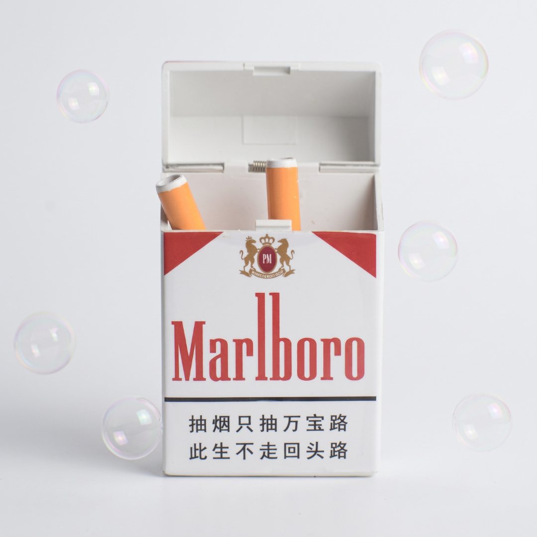 Bubble Cigarette Toy Pack - Puff-Powered Soap Bubble Blower Sticks - open pack with two bubble sticks and soap bubbles