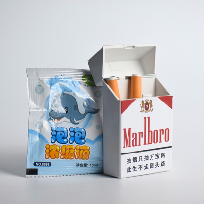 Bubble Cigarette Toy Pack - Puff-Powered Soap Bubble Blower Sticks - open pack beside the bubble solution sachet
