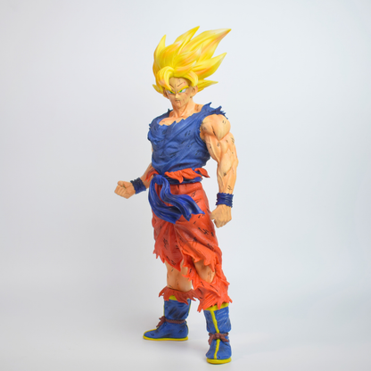 Dragon Ball Z: Legendary Super Saiyan Goku Action Figure - full figure front view in torn blue vest and orange pants