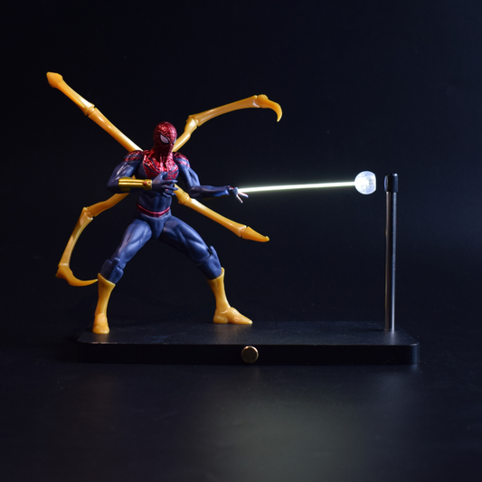 Spider-Man Magnetic Levitation Lamp - Floating Glowing Web, Black & Red Suit with Mechanical Arms - front view with the glowing beam